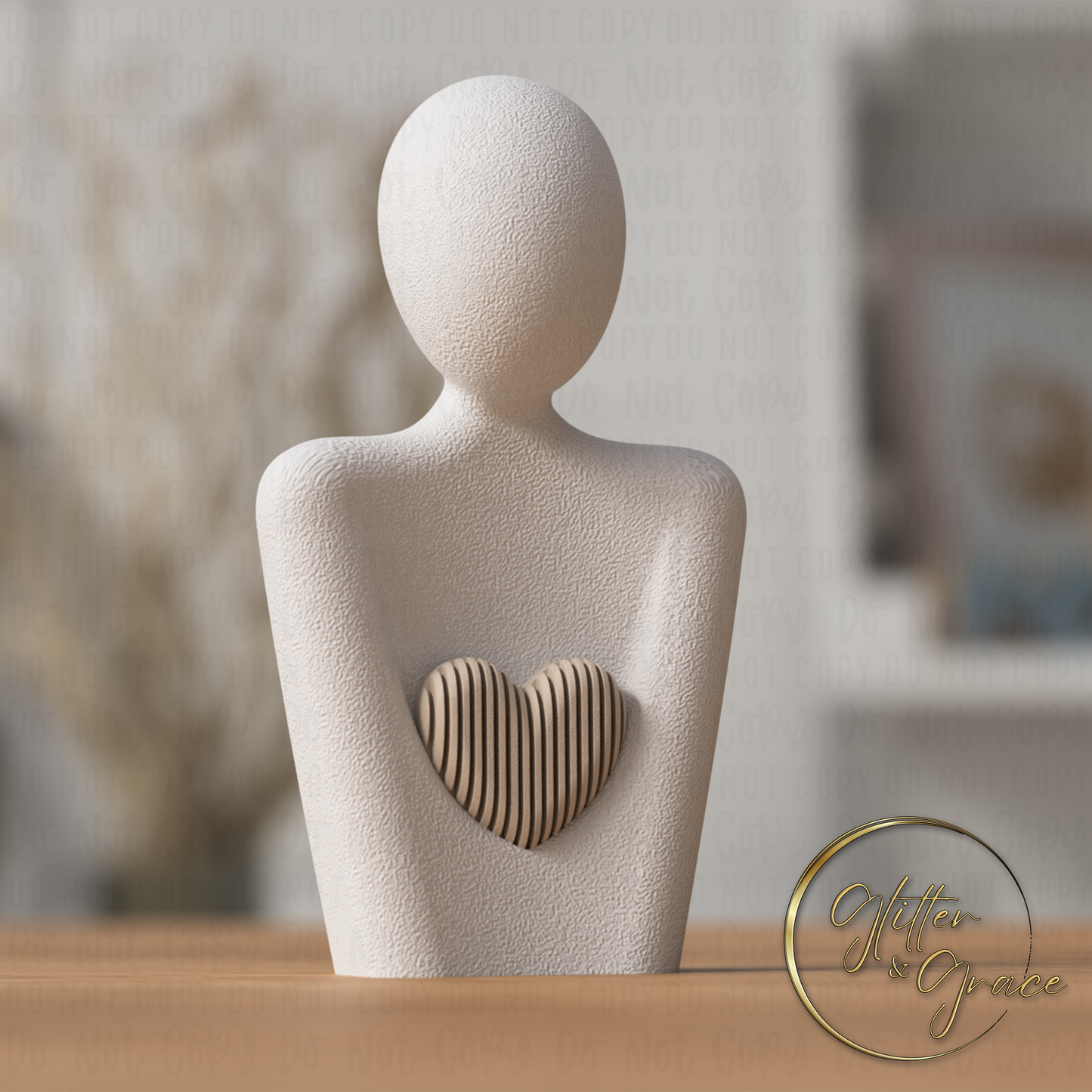 3d printed statue of a mother with a heart above the arms