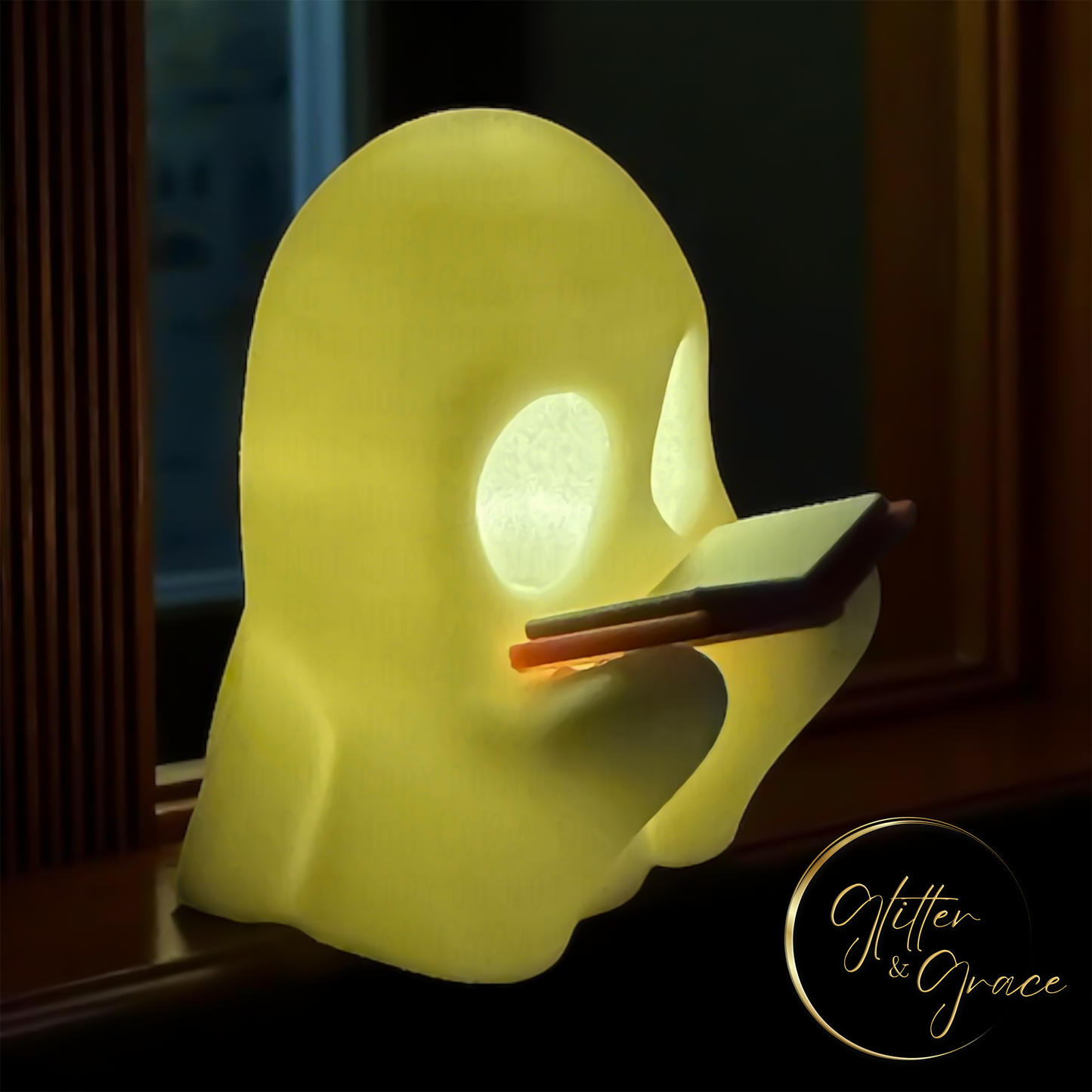3d printed figurine of a ghost reading a book