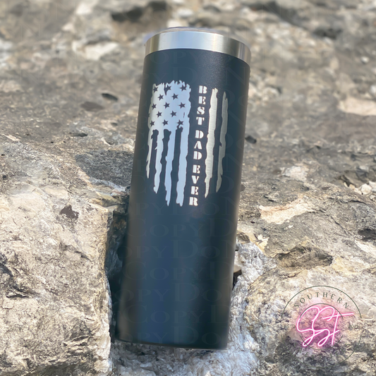20oz skinny powder coated tumbler in the color black laser engraved with an american flag saying best dad ever