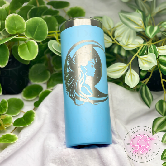 20oz skinny powder coated tumbler in sky blue color laser engraved with a fairy and moon