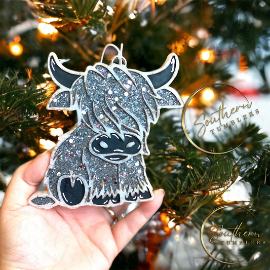 adorable car air freshener shaped as a highland cow decorated with beautiful grey glitter and black paint