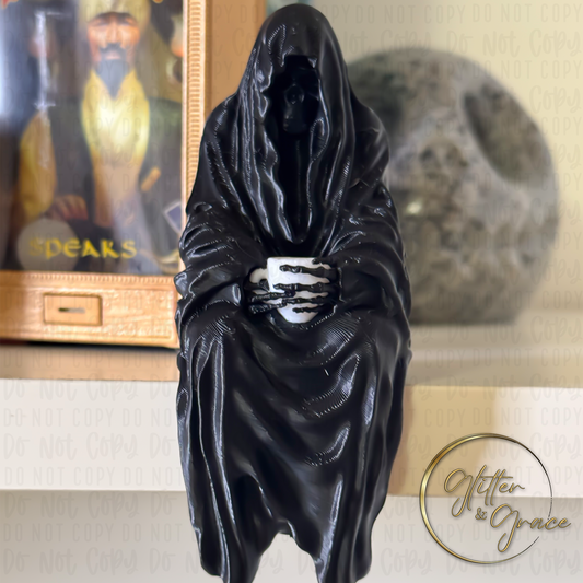3d printed figurine of the grim reaper sitting on a shelf holding a cup of coffee 