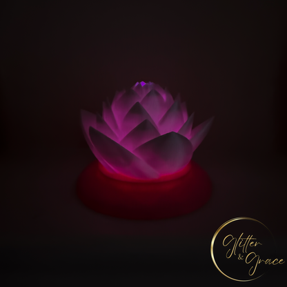 3d printed lotus flower sitting on a base that hides the LED tealight candle illuminating the flower