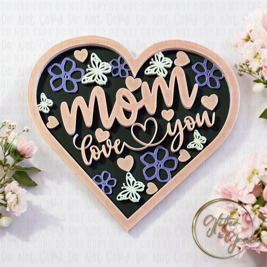 3d printed heart shaped sign saying mom love you with images of butterflies, flowers and hearts