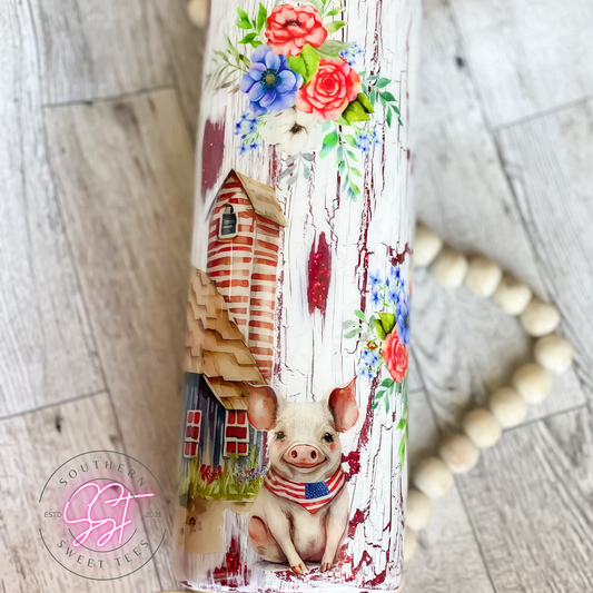 20oz skinny straight tumbler decorated with red glitter underneath rustic crackling paint with a farm scene and red what and blue florals