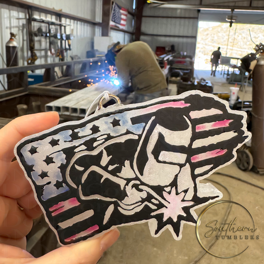 American flag shaped vehicle air freshener with the outline of a welder