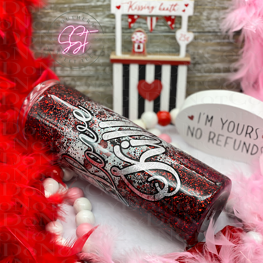 Red and black glittered 20oz skinny tumbler saying love kills with a skull head in white with red heart shaped eyes as the background