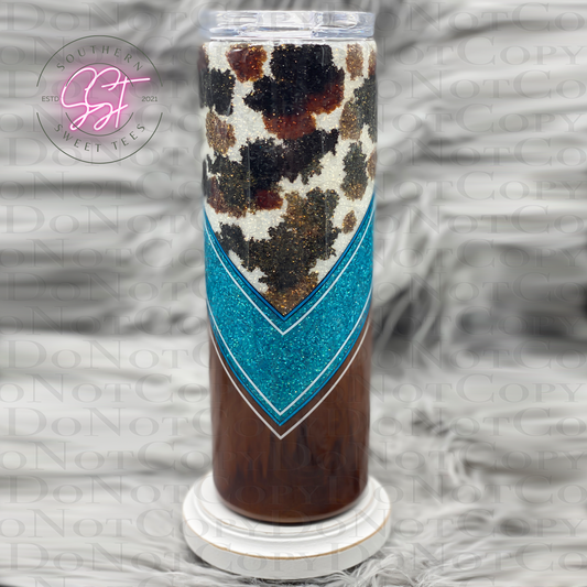 white and teal glittered 20oz skinny tumbler with hand added cow print and tooled vinyl with teal black and white striping